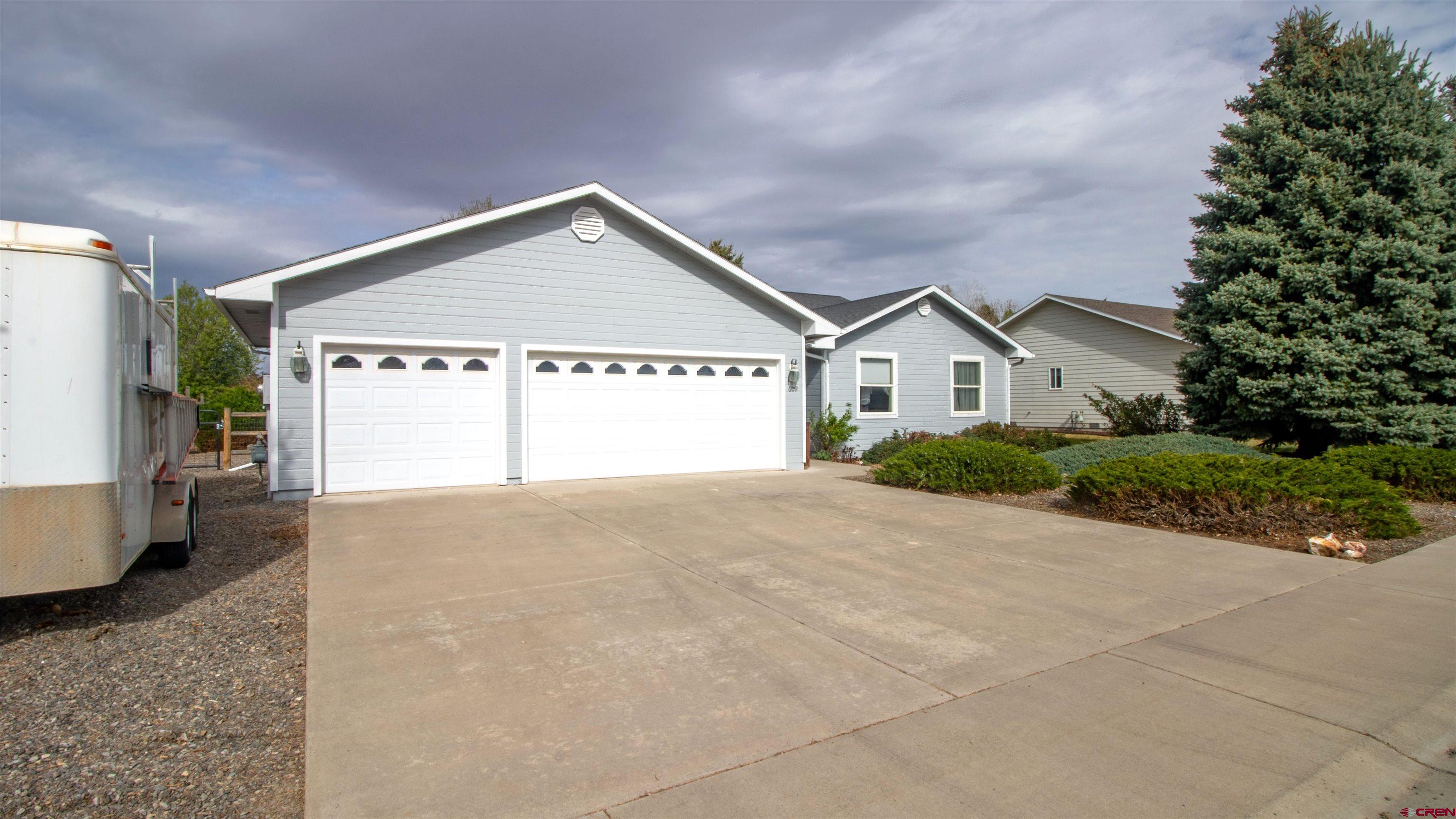 609 Heather Lane Montrose, CO 81401 - Photo 28 of 34 a view of garage with kitchen