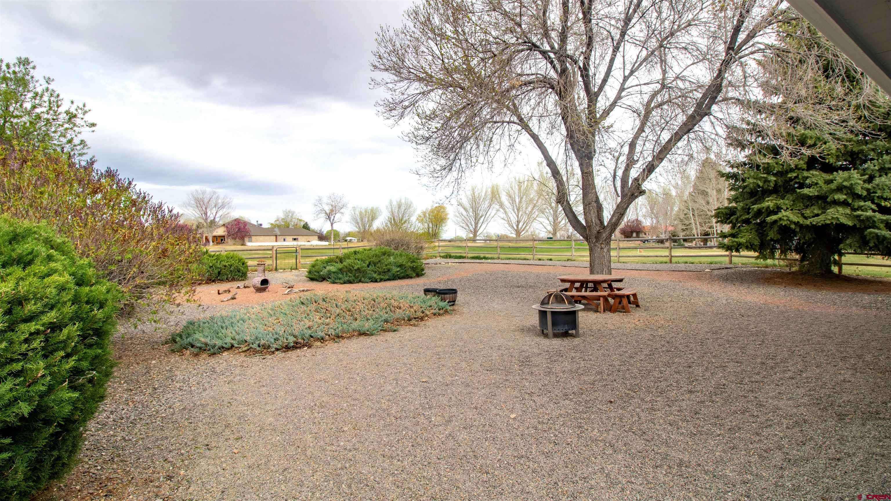609 Heather Lane Montrose, CO 81401 - Photo 29 of 34 a view of park with large trees