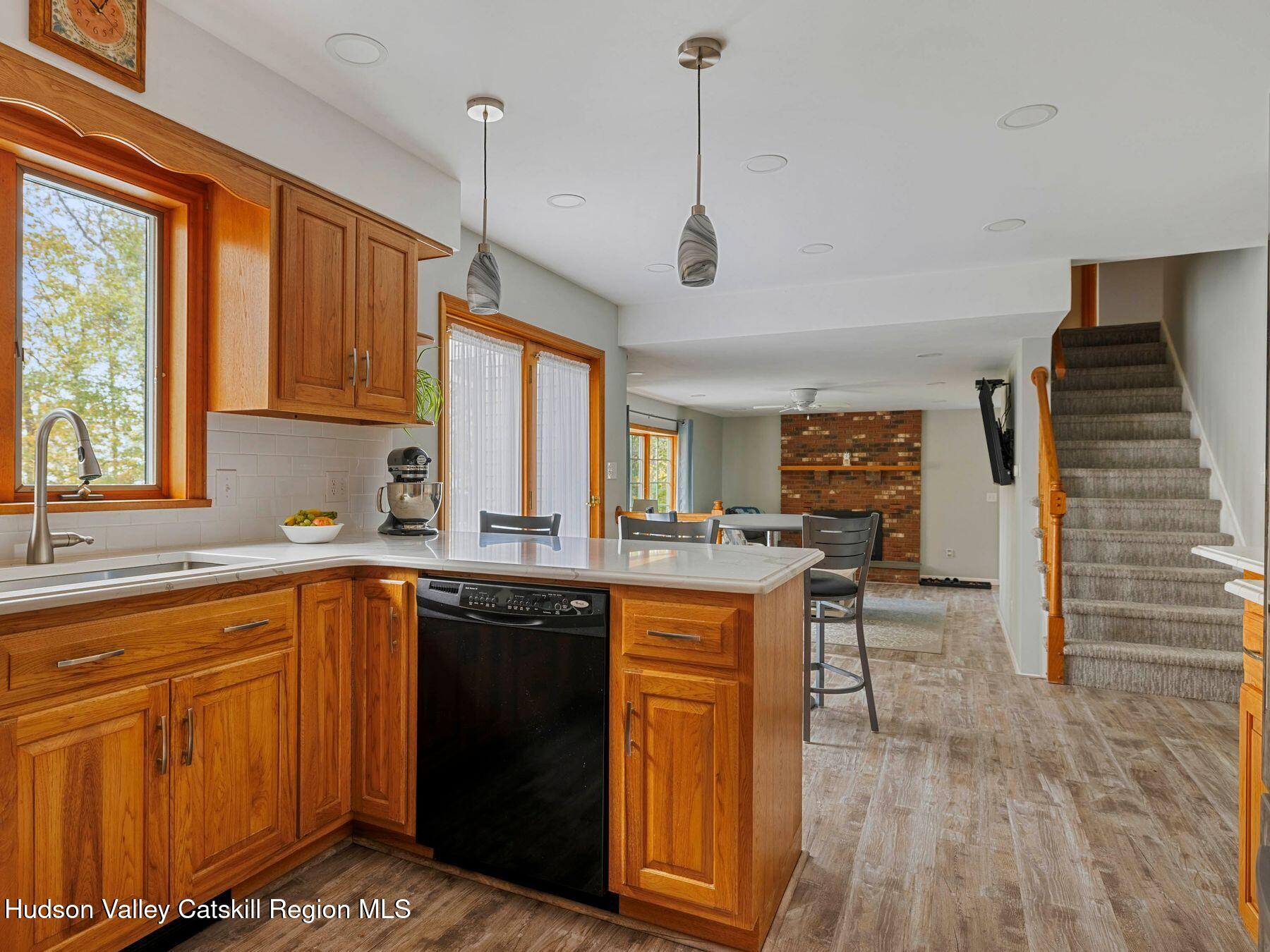 15 Ruby Meadows Road Lake Katrine, NY 12449 - Photo 24 of 53 a kitchen with a sink stove and cabinets