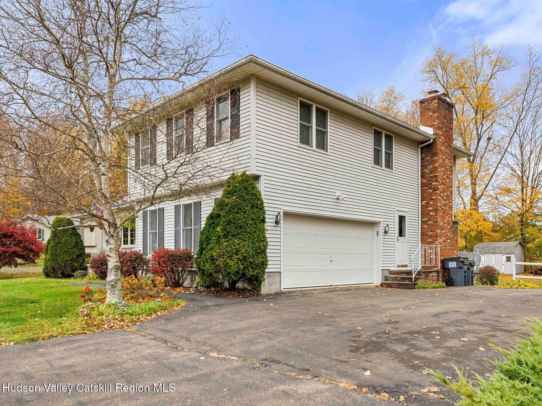 15 Ruby Meadows Road Lake Katrine, NY 12449 - Photo 3 of 53 a front view of house with garage and yard