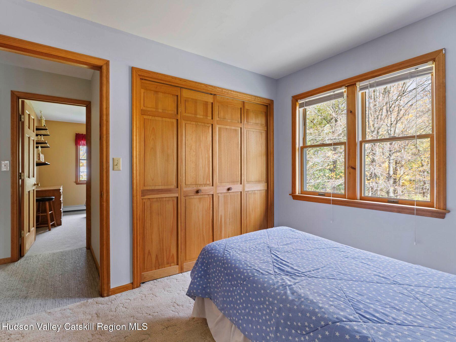 15 Ruby Meadows Road Lake Katrine, NY 12449 - Photo 35 of 53 a bedroom with a bed and a window