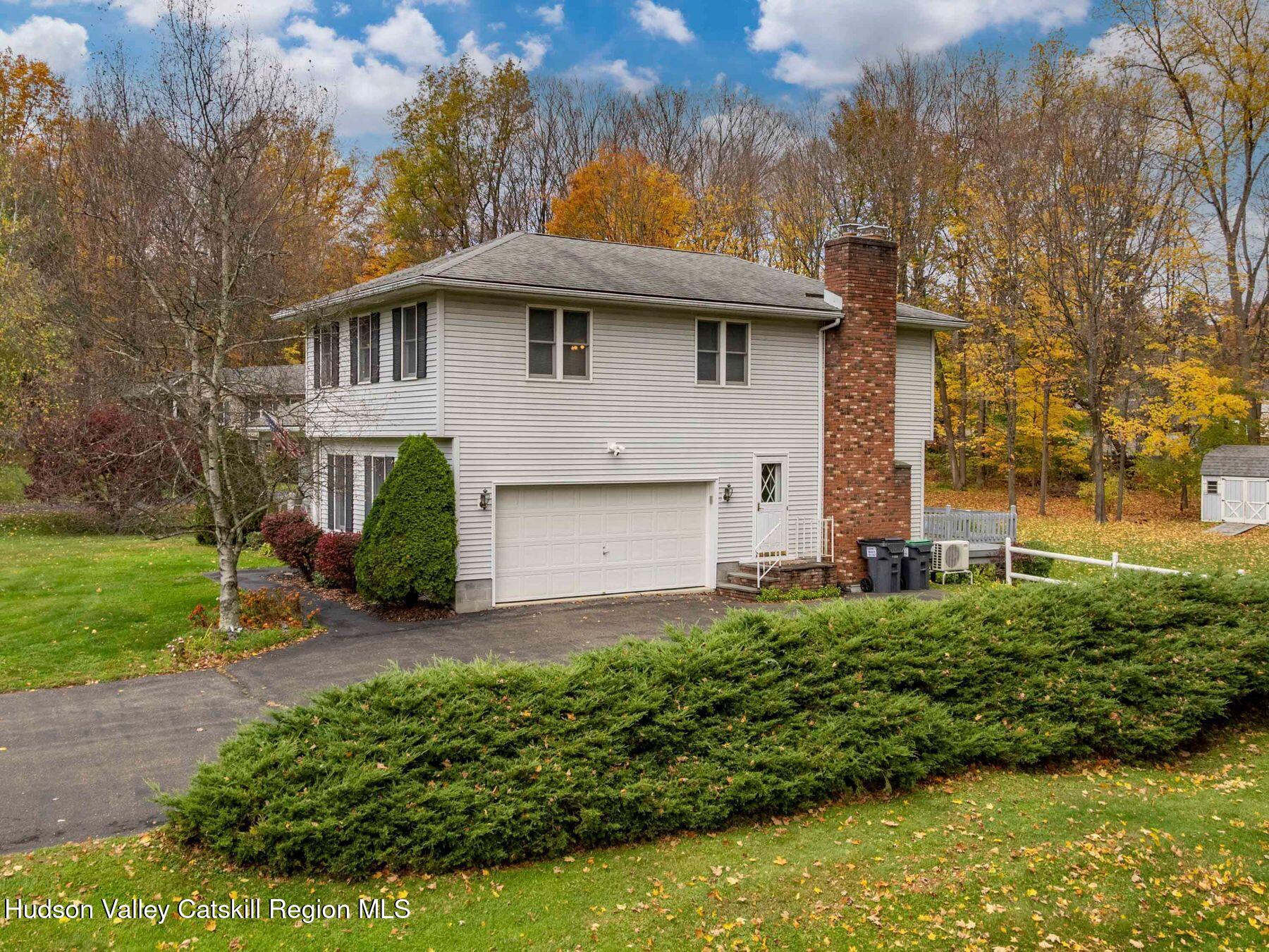 15 Ruby Meadows Road Lake Katrine, NY 12449 - Photo 43 of 53 a front view of a house with a yard