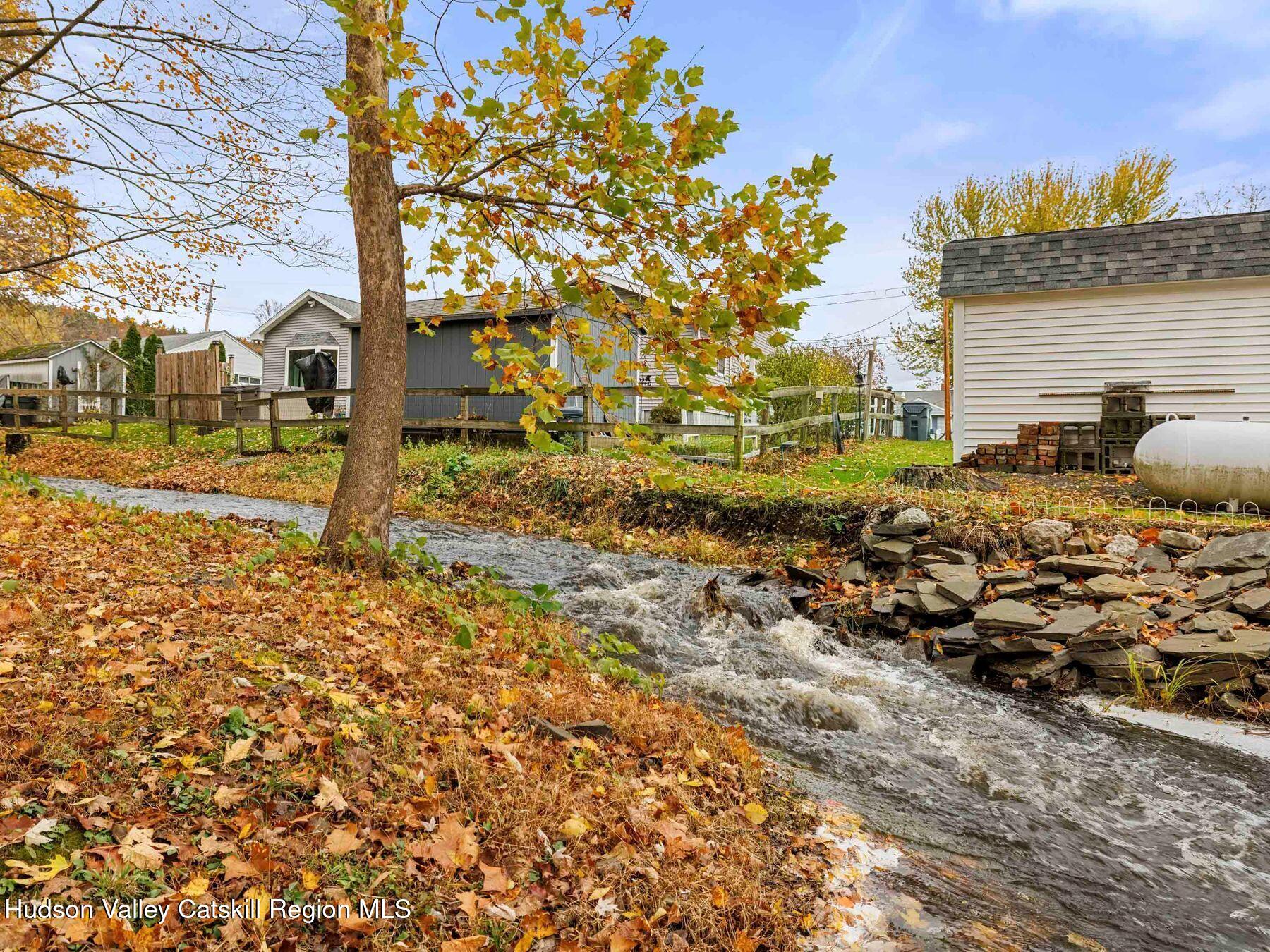 15 Ruby Meadows Road Lake Katrine, NY 12449 - Photo 49 of 53 a backyard of a house with lots of green space