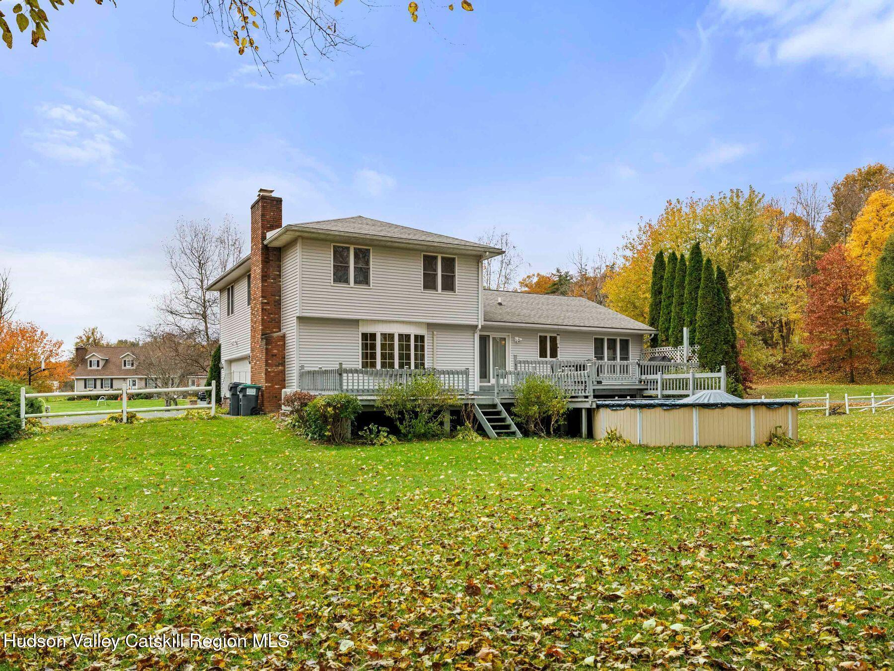 15 Ruby Meadows Road Lake Katrine, NY 12449 - Photo 6 of 53 a view of a house with a big yard and potted plants