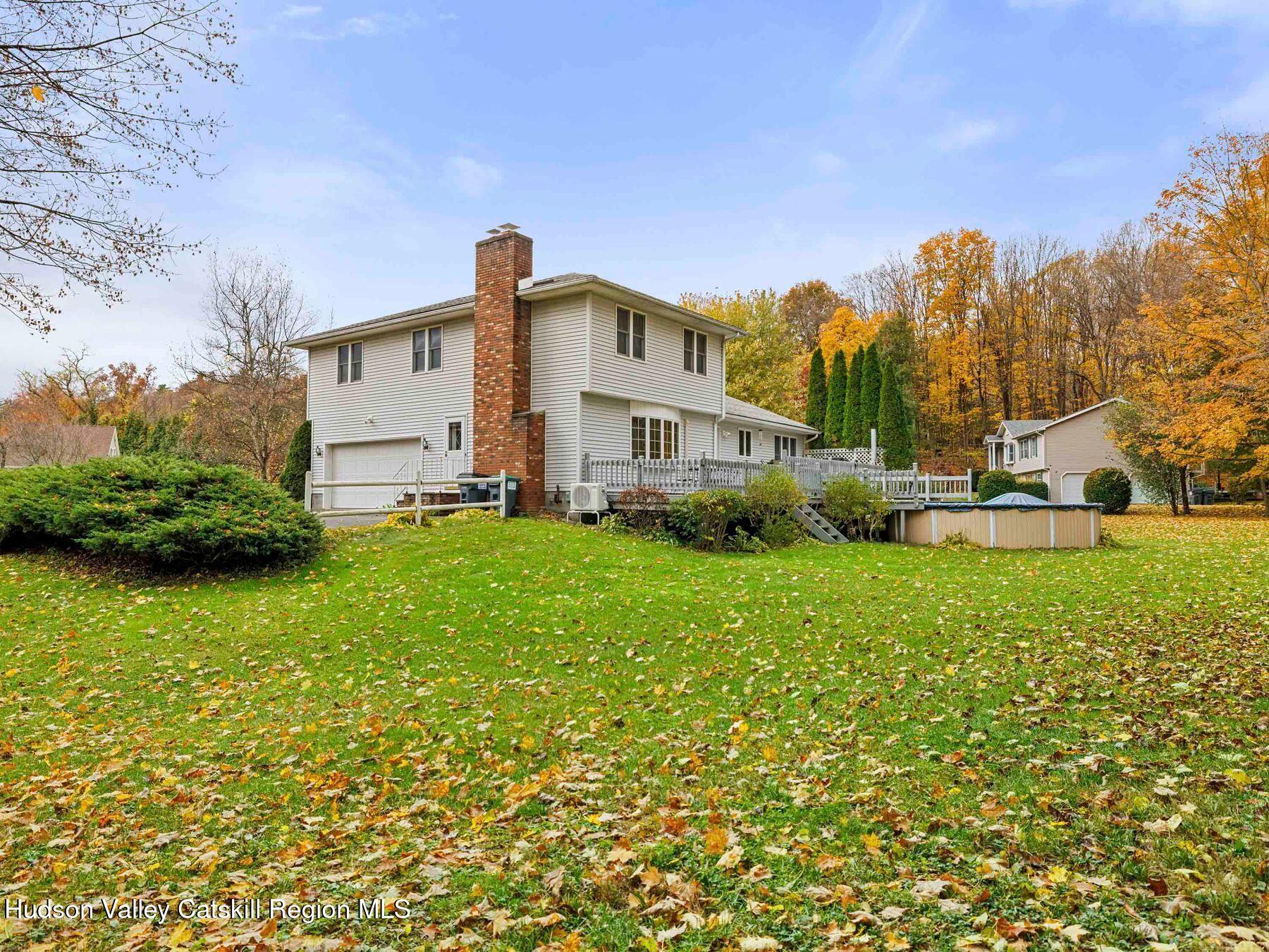 15 Ruby Meadows Road Lake Katrine, NY 12449 - Photo 7 of 53 a front view of a house with garden