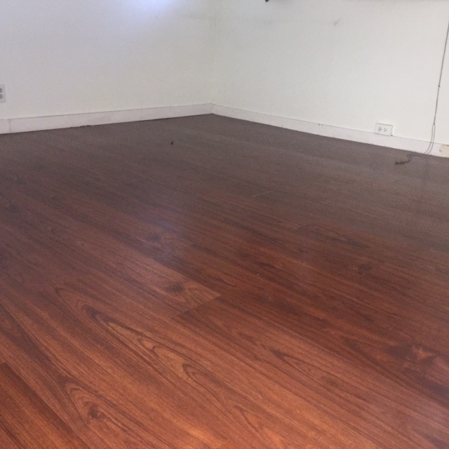 3559 Lower Honoapiilani Road, Unit 718 Lahaina, HI 96761 - Photo 14 of 23 an empty room with wooden floor