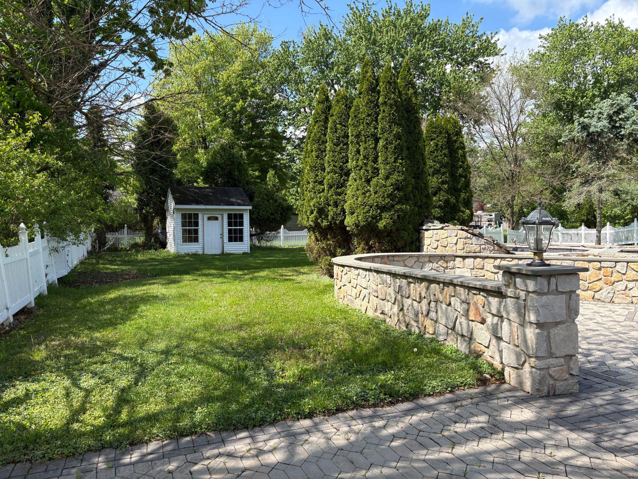 1021 Meetinghouse Road Ambler, PA 19002 - Photo 8 of 41 Charming garden retreat with stone wall.