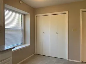 a view of a window in an empty room