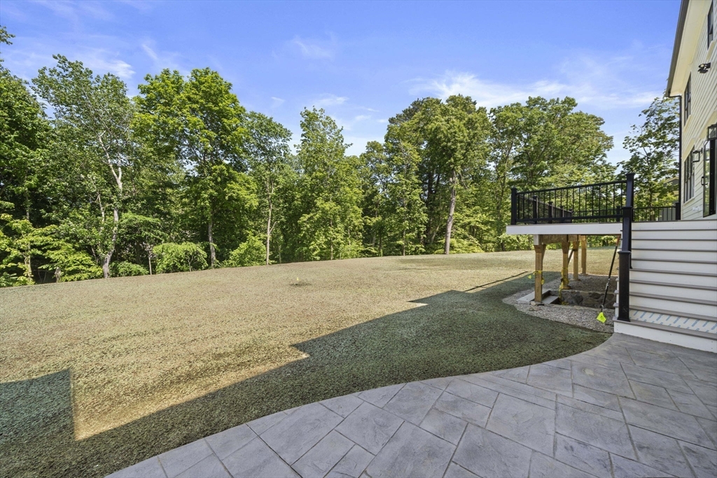 448 York Street Canton, MA 02021 - Photo 8 of 11 a view of a yard with basketball court