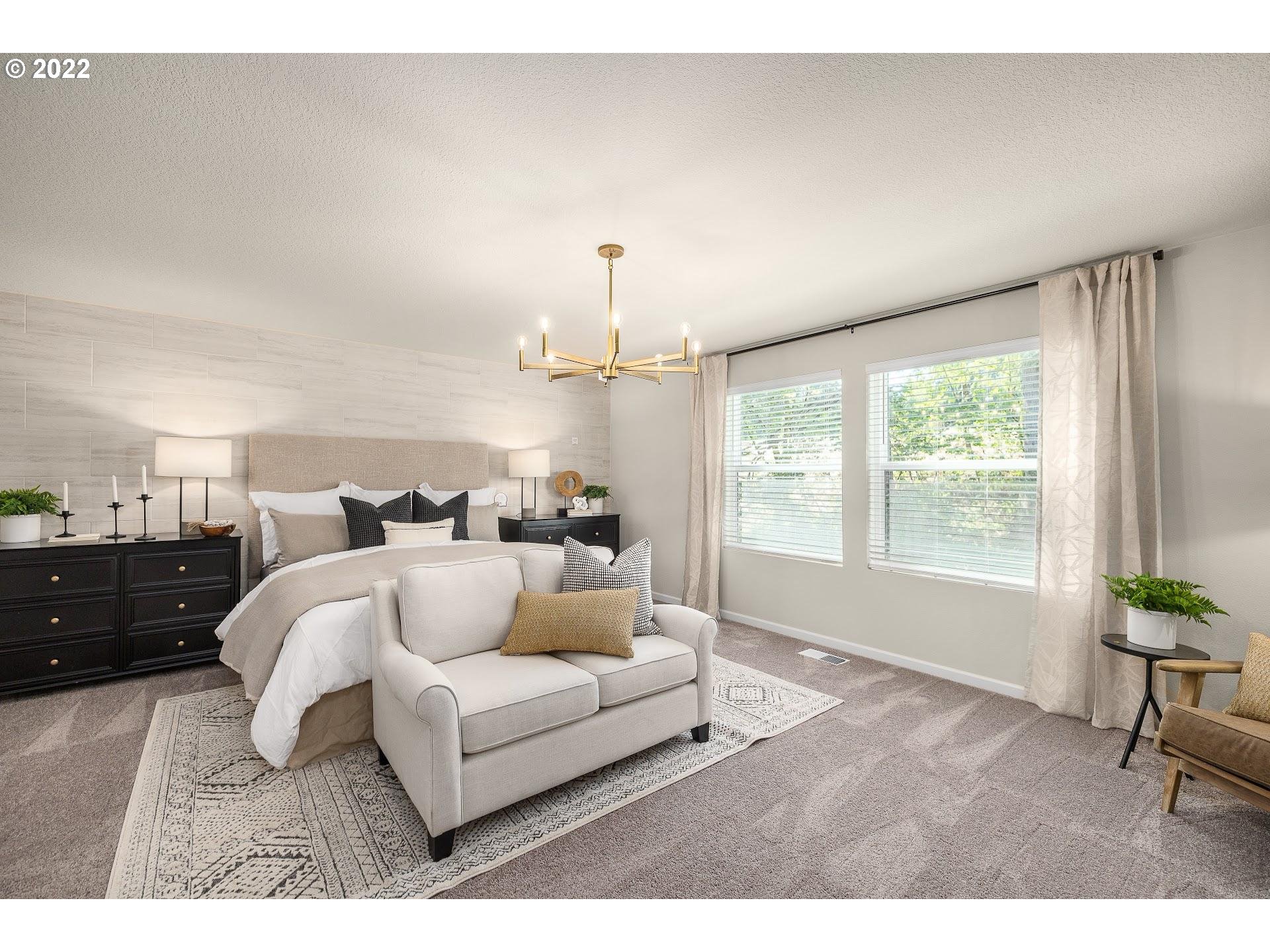 2408 South Brookside Place Ridgefield, WA 98642 - Photo 16 of 32 a living room with furniture and a large window