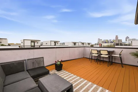 a view of a terrace with seating area