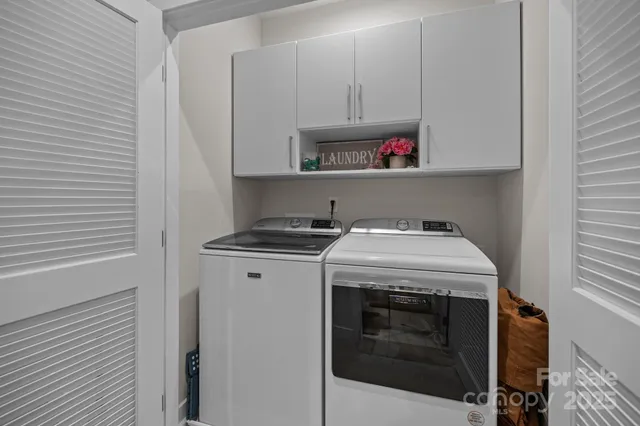 a view of a building and a street sign