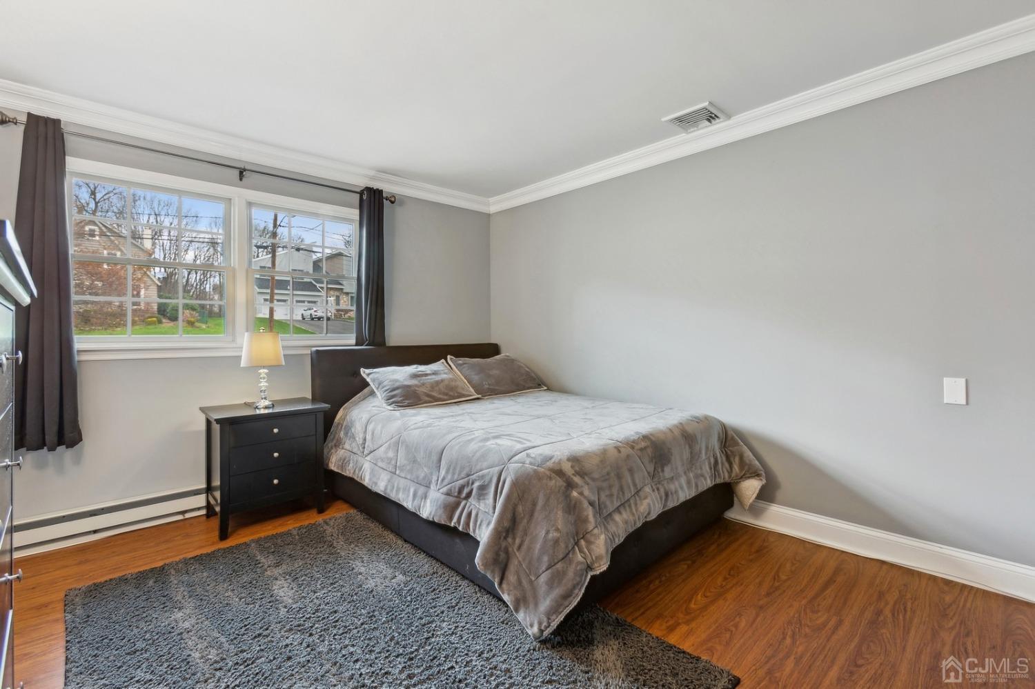 33 King Street Edison, NJ 08820 - Photo 24 of 44 a bedroom with a bed and window