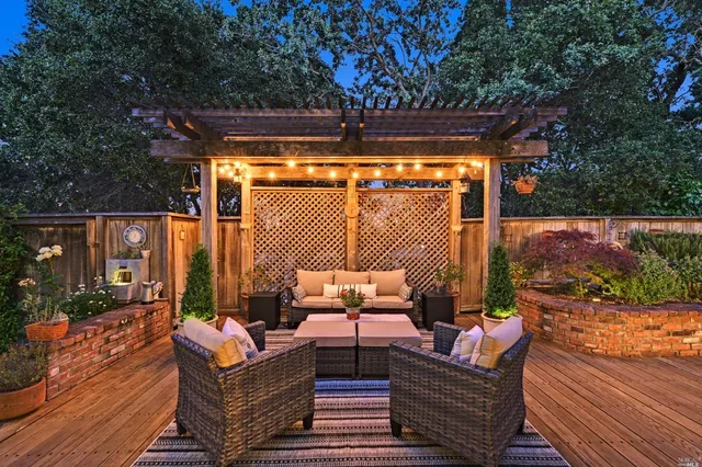 a outdoor living space with patio furniture and a potted plant