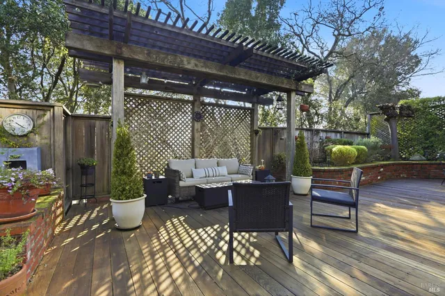 a outdoor living space with furniture and garden view