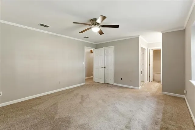 a bathroom with a double vanity sink a mirror and a bathtub