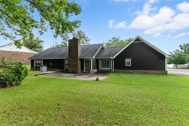a house view with a garden space