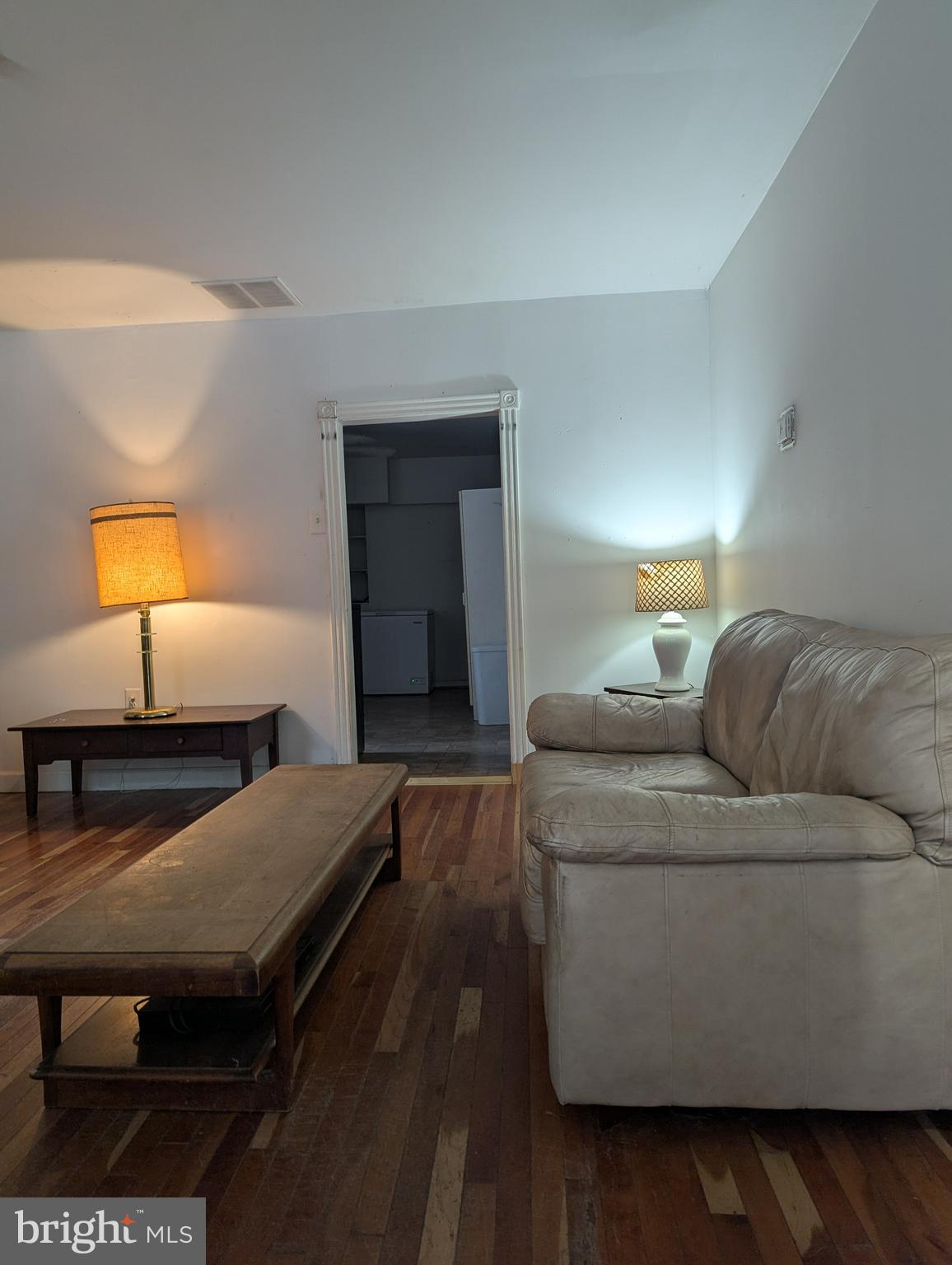 1506 Mill Race Road Baltimore, MD 21211 - Photo 9 of 13 a living room with a bed and furniture