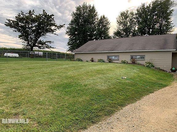 11011 West Nora Road Winslow, IL 61089 - Photo 15 of 20 a house view with a garden space