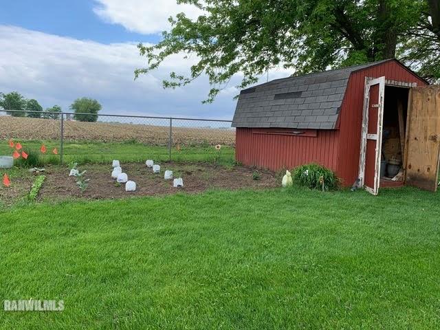 11011 West Nora Road Winslow, IL 61089 - Photo 16 of 20 a backyard of a house with lots of green space