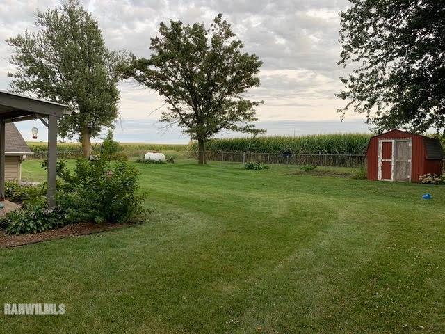 11011 West Nora Road Winslow, IL 61089 - Photo 20 of 20 a view of a house with a big yard
