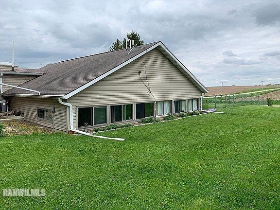 11011 West Nora Road Winslow, IL 61089 - Photo 2 of 20 a front view of house with yard and green space