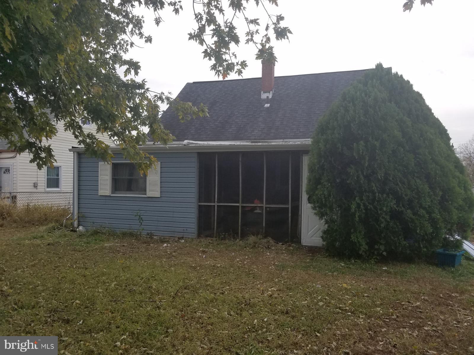 7404 Belclare Road Baltimore, MD 21222 - Photo 5 of 5 a view of a house with a yard