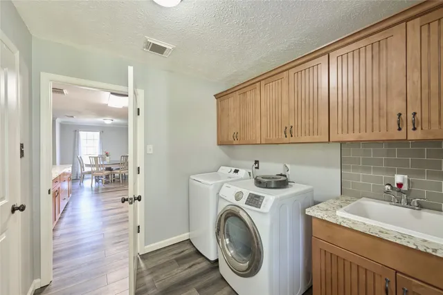 a view of kitchen and washer and dryer