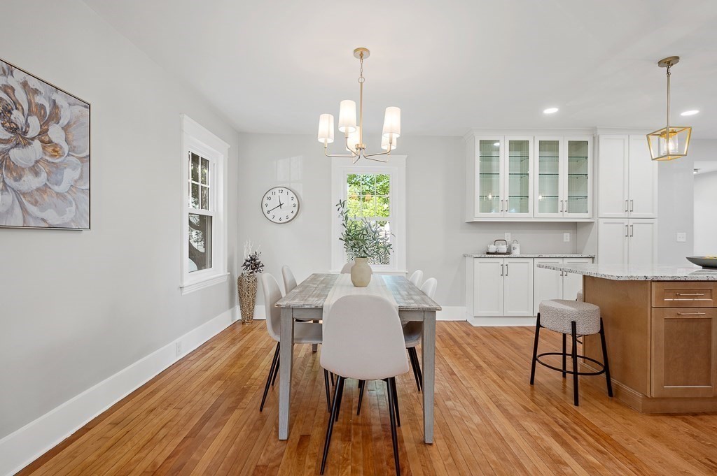 47 Brighton Road Worcester, MA 01606 - Photo 11 of 39 a view of a dining room with furniture window and wooden floor