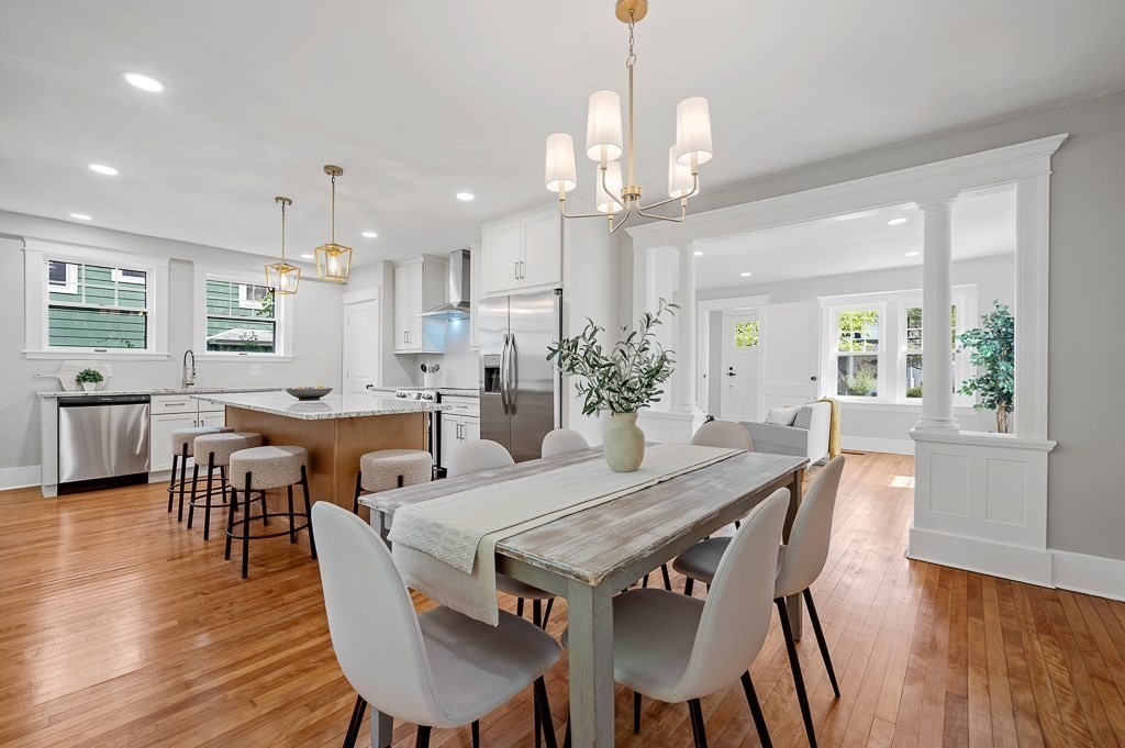 47 Brighton Road Worcester, MA 01606 - Photo 12 of 39 a view of a dining room with furniture window and wooden floor
