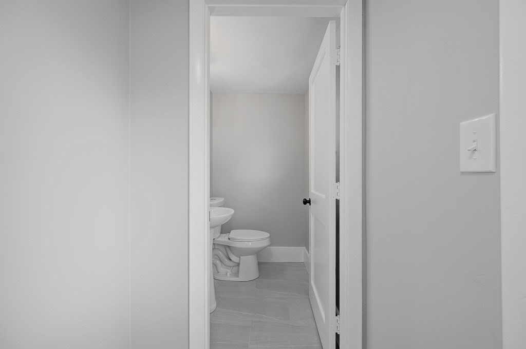 47 Brighton Road Worcester, MA 01606 - Photo 18 of 39 a bathroom with a toilet
