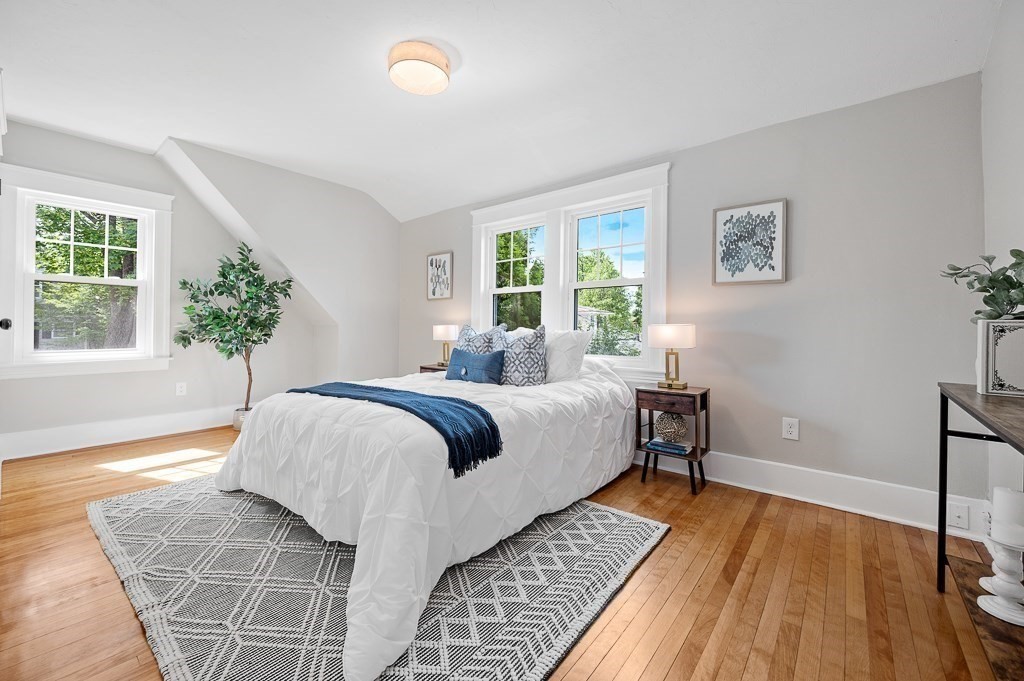 47 Brighton Road Worcester, MA 01606 - Photo 23 of 39 a bedroom with a large bed and a window