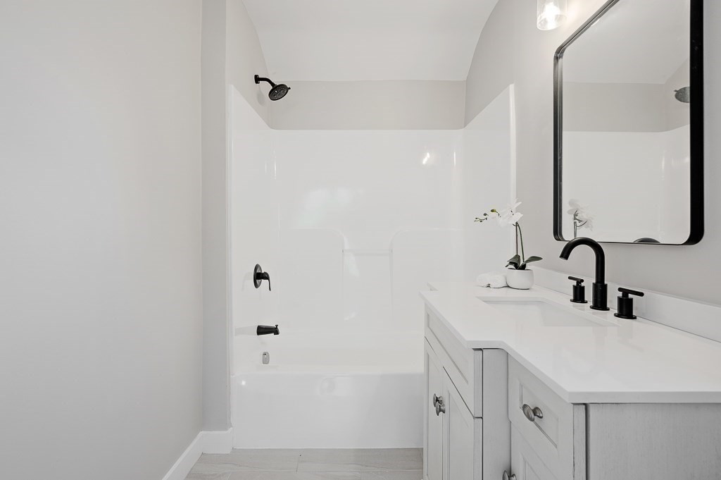 47 Brighton Road Worcester, MA 01606 - Photo 26 of 39 a bathroom with a sink and a mirror