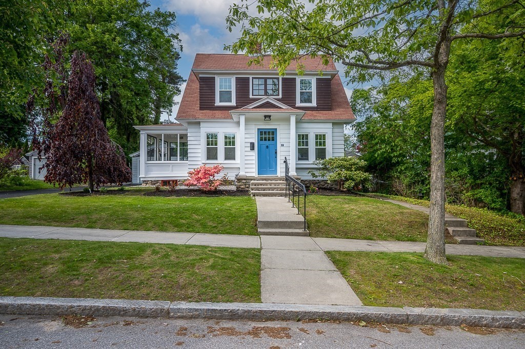 47 Brighton Road Worcester, MA 01606 - Photo 3 of 39 a front view of a house with a yard