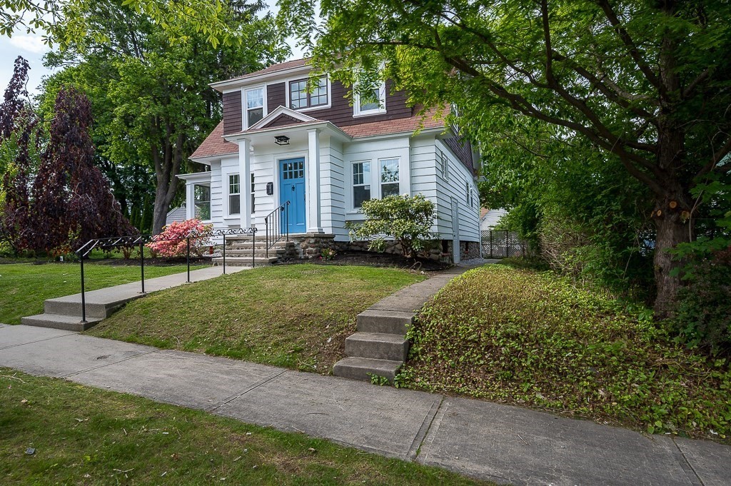 47 Brighton Road Worcester, MA 01606 - Photo 4 of 39 a front view of house with yard and green space