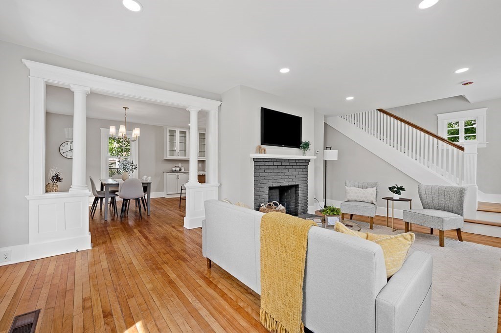 47 Brighton Road Worcester, MA 01606 - Photo 7 of 39 a living room with furniture fireplace and a flat screen tv