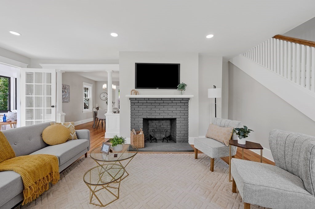 47 Brighton Road Worcester, MA 01606 - Photo 8 of 39 a living room with furniture and a fireplace