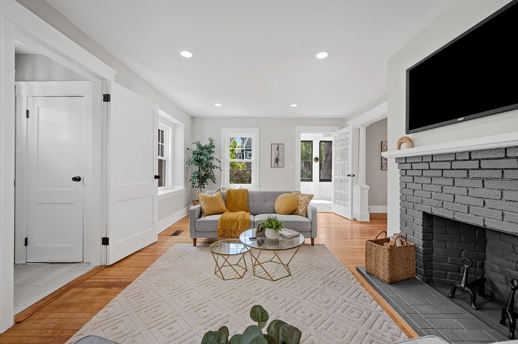 47 Brighton Road Worcester, MA 01606 - Photo 9 of 39 a living room with furniture and a flat screen tv