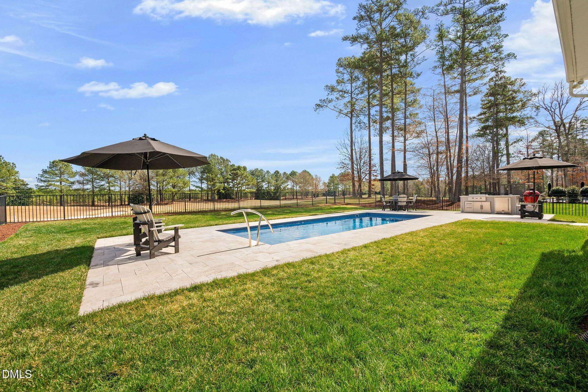 7440 Hasentree Way Wake Forest, NC 27587 - Photo 17 of 64 a view of a park with large trees