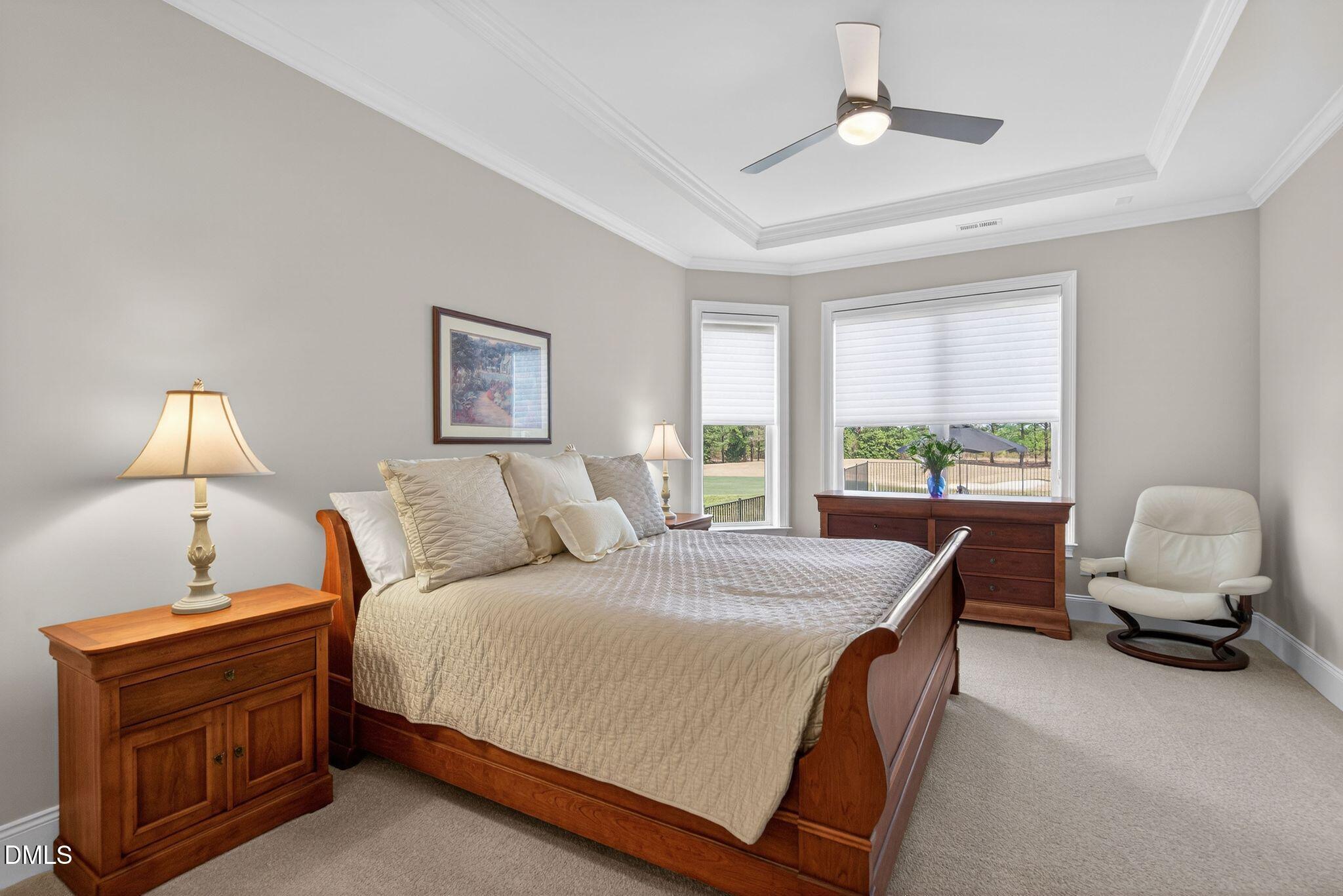 7440 Hasentree Way Wake Forest, NC 27587 - Photo 36 of 64 a bedroom with a bed and window