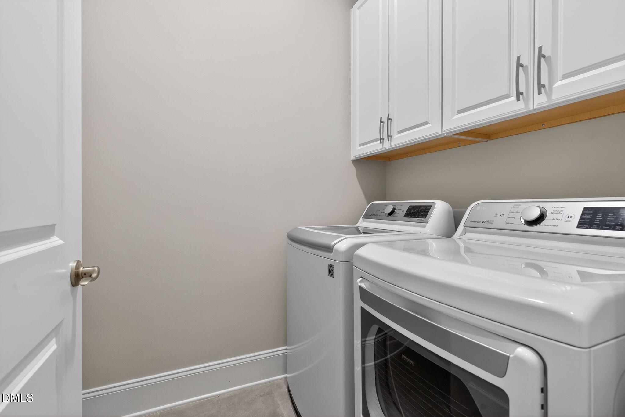 7440 Hasentree Way Wake Forest, NC 27587 - Photo 41 of 64 a utility room with dryer and washer