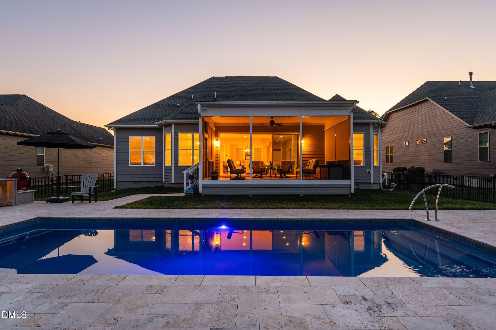 7440 Hasentree Way Wake Forest, NC 27587 - Photo 49 of 64 a view of swimming pool with an outdoor seating