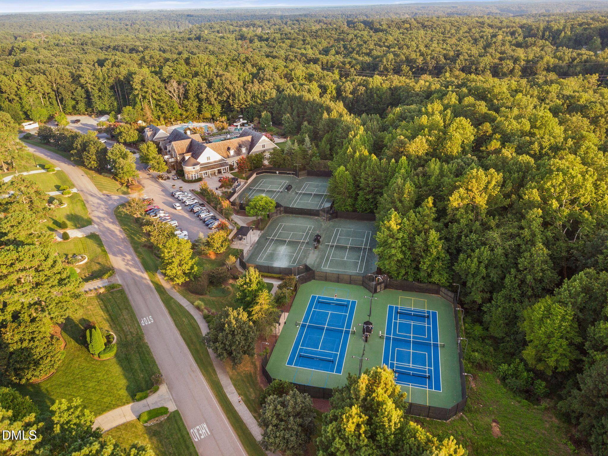 7440 Hasentree Way Wake Forest, NC 27587 - Photo 53 of 64 an aerial view of residential houses with outdoor space