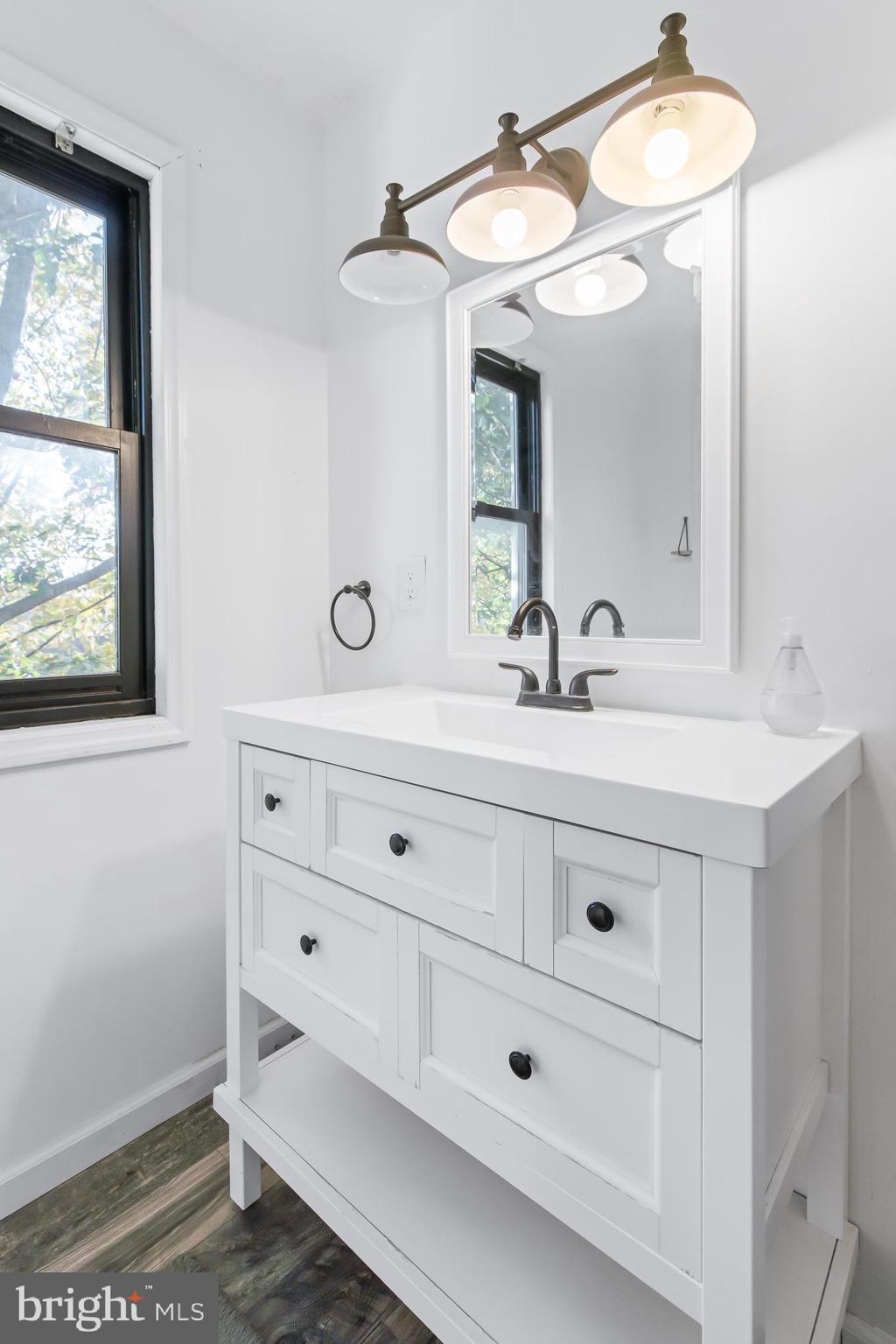 403 Cardinal Road Lititz, PA 17543 - Photo 22 of 29 a bathroom with a sink a vanity and a mirror