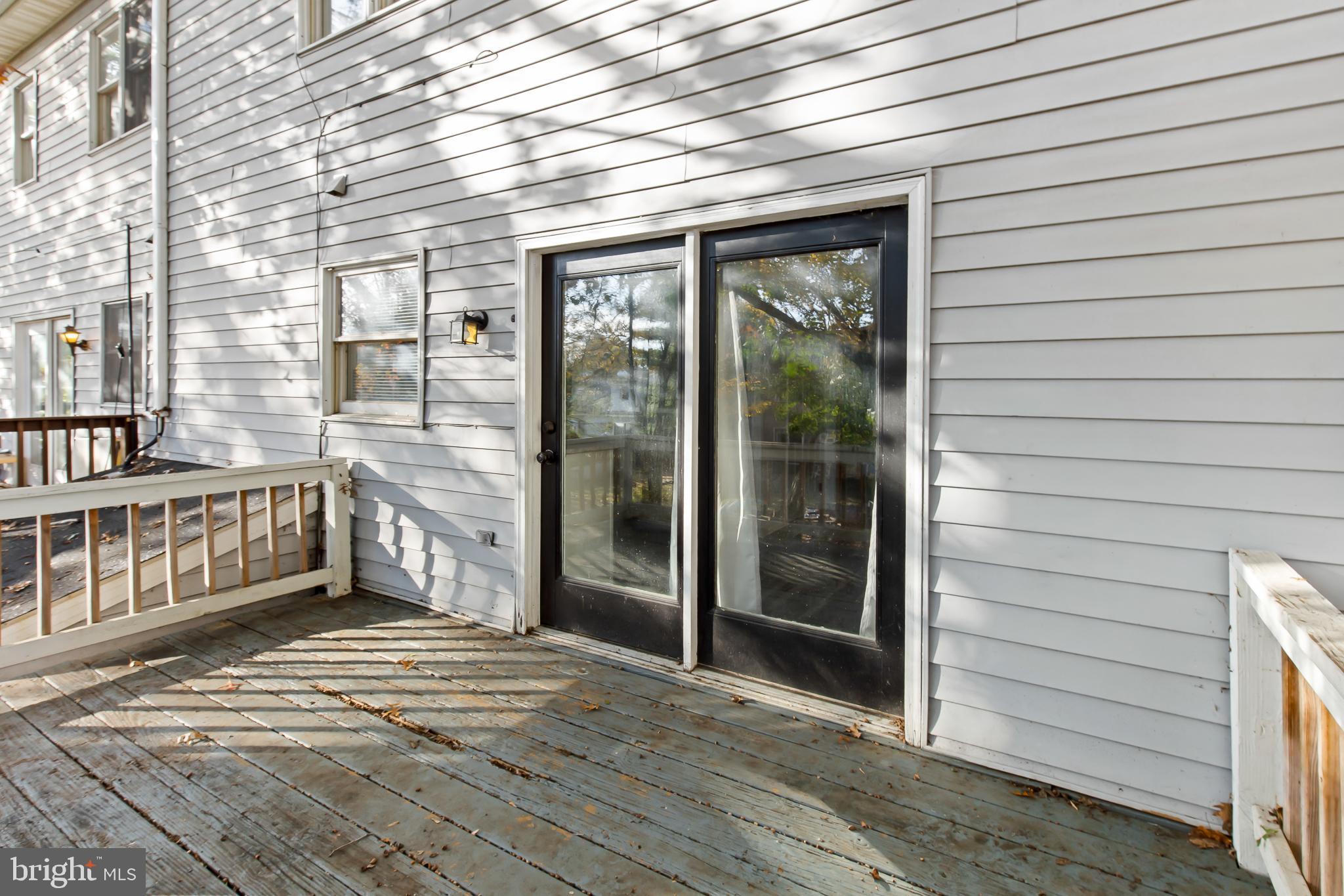 403 Cardinal Road Lititz, PA 17543 - Photo 27 of 29 a view of a porch with a table and chairs