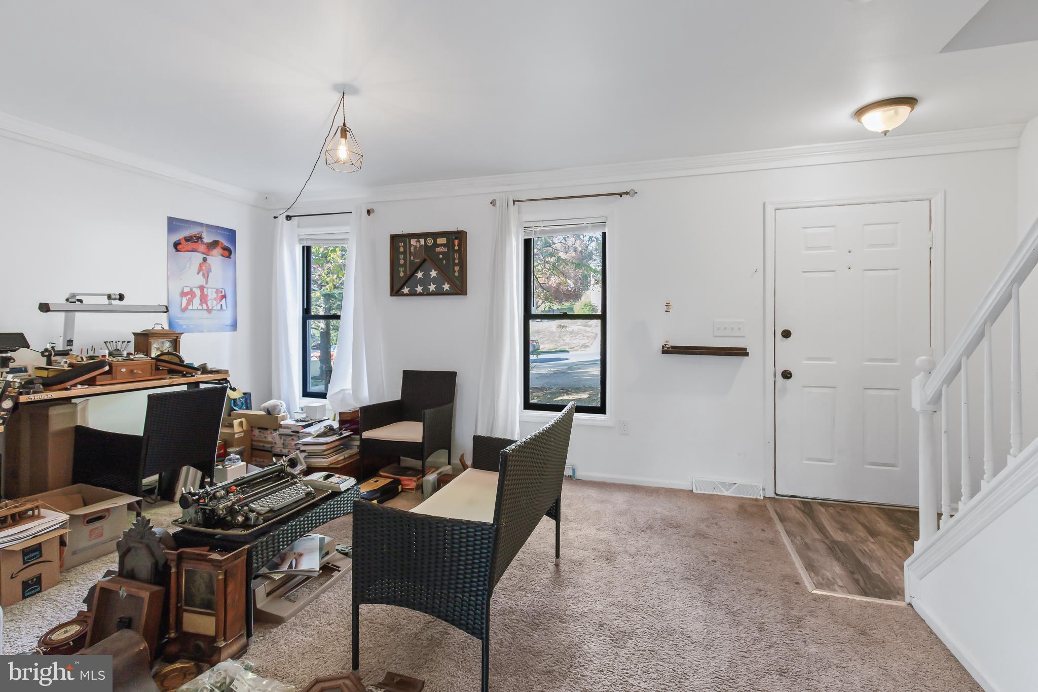 403 Cardinal Road Lititz, PA 17543 - Photo 3 of 29 a view of a workspace with furniture and a window