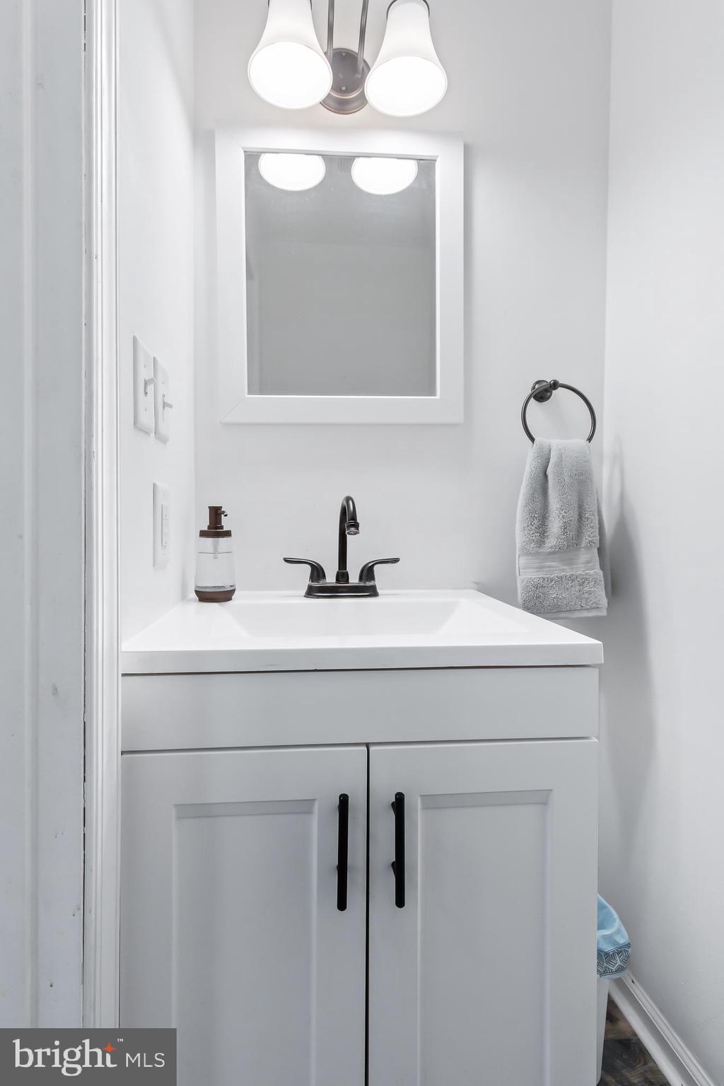403 Cardinal Road Lititz, PA 17543 - Photo 10 of 29 a bathroom with a sink and a mirror