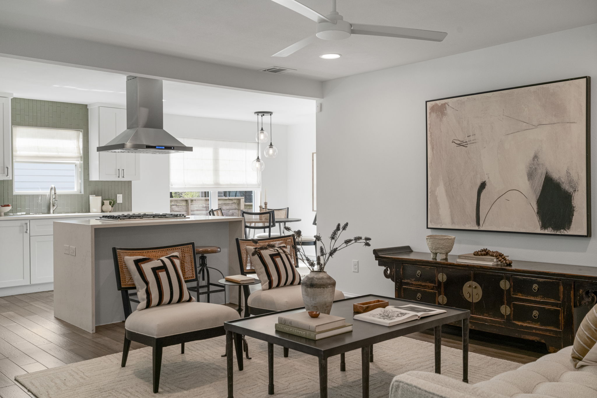 605 Harris Avenue Austin, TX 78705 - Photo 11 of 34 The open layout does what a great main level should with living, dining, and kitchen flowing into one another naturally.