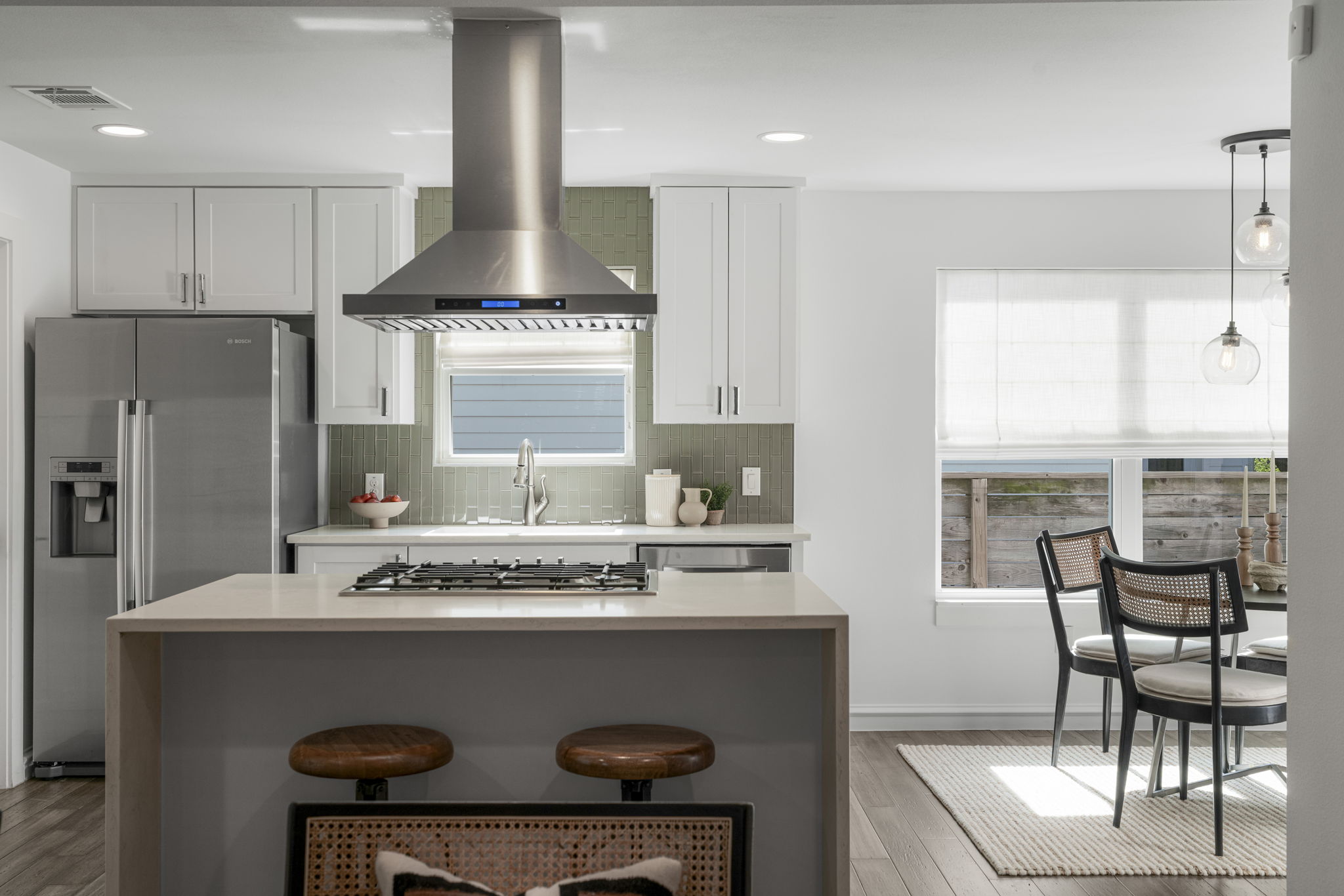 605 Harris Avenue Austin, TX 78705 - Photo 15 of 34 From the island to the dining area, the entire main level feels designed for the way people actually live and gather.