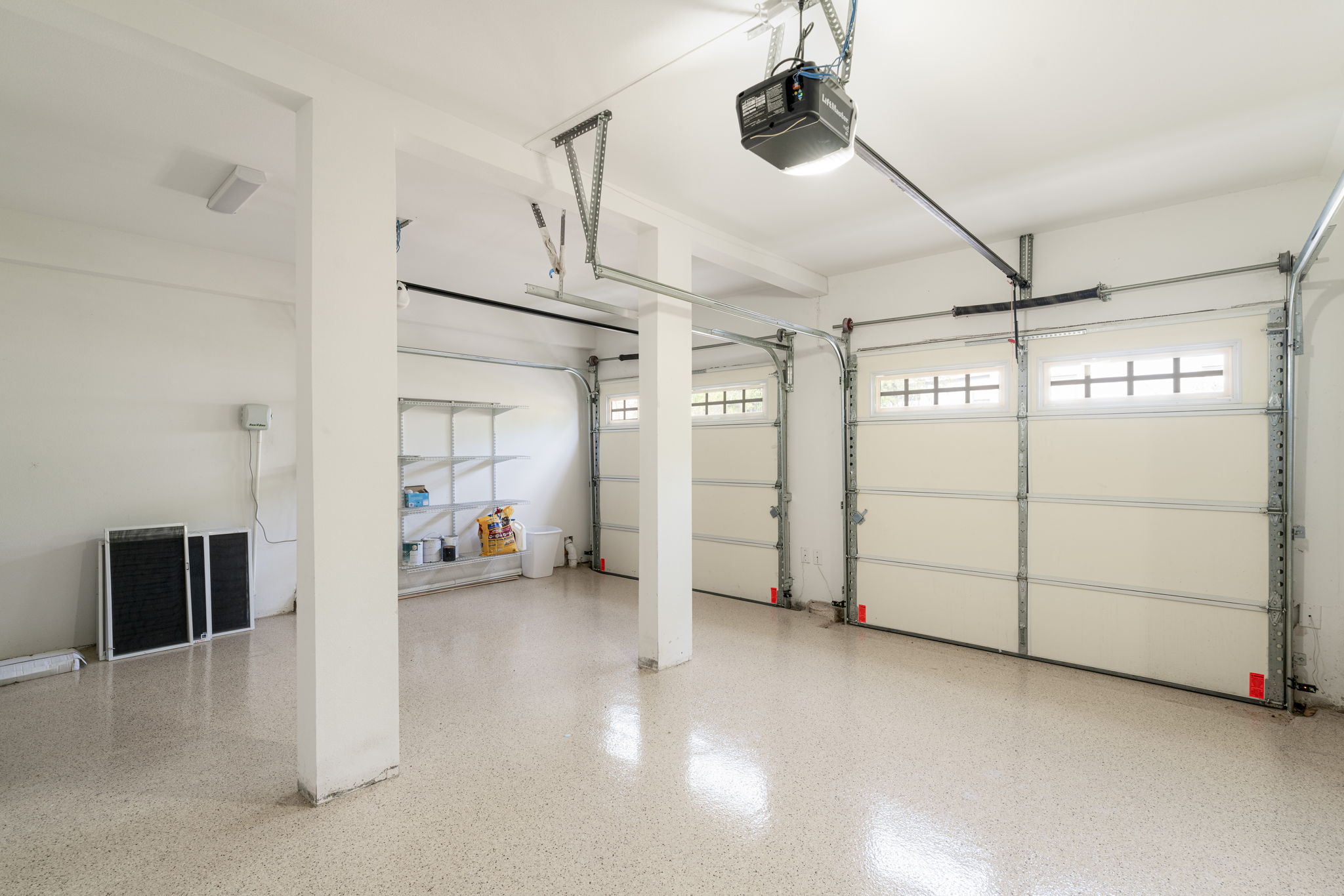 605 Harris Avenue Austin, TX 78705 - Photo 26 of 34 With this much room and two garage doors, the possibilities go well beyond parking, which is a rare find in central Austin.